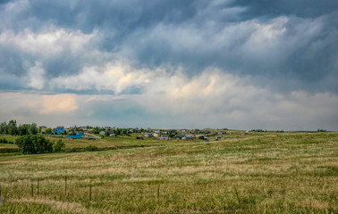 Storm over the plains of the midwestern United States. Farm and stormy sky