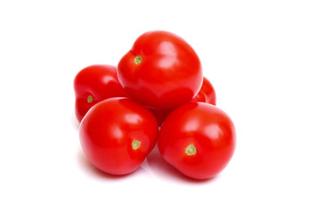 bunch of fresh red tomatoes isolated on white background