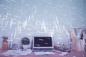 Financial market graph hologram and personal computer on background. Multi exposure. Concept of forex.