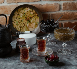 azerbaijani tea setup with black tea and feijoa and walnut jams