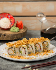 crab stick sushi rolls topped with crispy sprinkles
