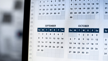 Calendar app on computer screen, future year plan, time management, reminder