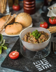 grilled aubergine salad in modern glass bowl