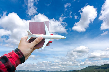 Tourist people holding airplane flight travel traveller fly traveling citizenship air on the around world for destination leisure. Travel Concept