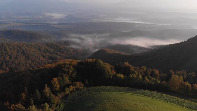 Autumn aerial view of a beautiful church on the top of a hill, in Slovenia