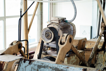 fragment of an old conche machine in the shop of a confectionery factory