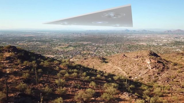 Triangle Alien Spaceship Hovering over Phoenix Arizona City Illustration Powerful Video Illustration using real footage with visual effect elements of Large Triangle Alien Spaceship Hovers over Phoeni