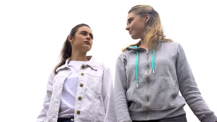 Two females looking at each other, envy problem, woman friendship stereotype