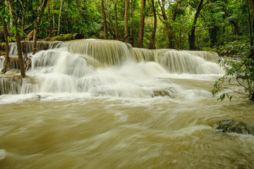 Huai Mae Khamin waterfall in the rainy season with turbid water,In the abundant natural forest