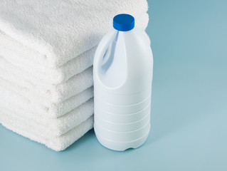laundry launderer bleach bottles and terry towel