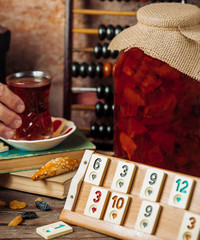 black tea and jam served for turkish okey game table a tile-based game