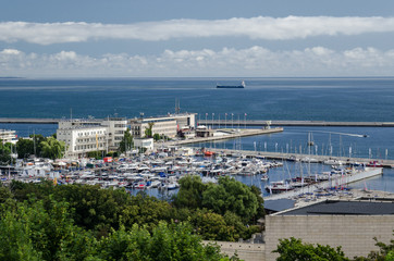 Fototapeta na wymiar MARINA AND SEAPORT - Sunny day on the bay and the sea coast in Gdynia