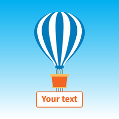 Fototapeta premium Hot air balloon with banner for text in blue sky