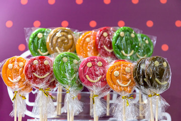 Colorful candies on a wooden stick.Sweets for children and adults.