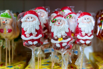 Colorful candy on a wooden stick.Sweets for children and adults.