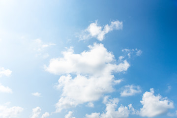 Nature Bright blue Sky with white clouds on blackground. Beautiful sky and clouds in the afternoon.