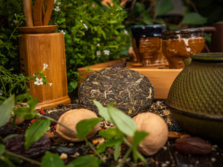 Preparation of the tea ceremony, tea in the bowl. Handmade cups