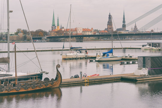 Vintage boat on Riga panorama background