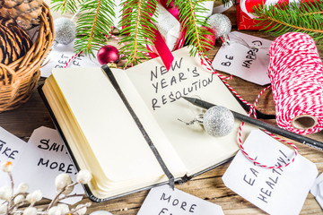New year resolution concept with different plan and goals, with New year and Christmas decorations,...
