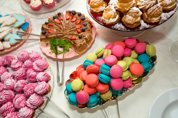 delicious sweet desserts on the festive table