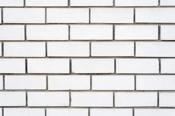 White brick wall background with cement grout