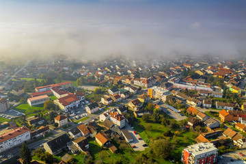 Fototapeta premium Bjelovar over clouds from above 