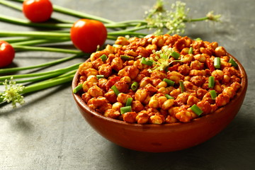 Spicy roasted chickpeas , Indian vegetarian curry background