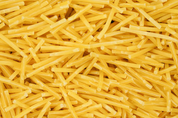 small pasta texture background closeup. vermicelli.  raw small noodles