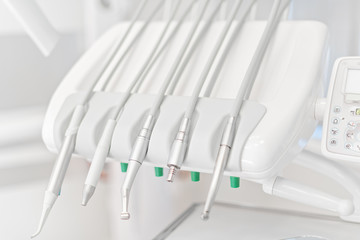 Dentist equipment in stomatology cabinet closeup