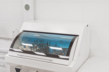 Dentist autoclave with tools inside