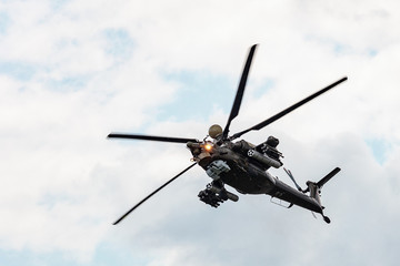 Fototapeta na wymiar Mi-28 UB attack helicopter performing demonstration flight. Mil 28 (NATO reporting name 