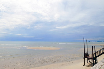 Landscape sea view and cloudy blue sky with the wood stairs at left corner
