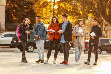 Group of teenage students outdoors