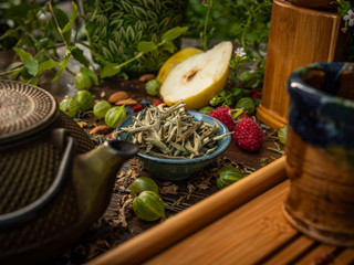 Preparation of the tea ceremony, tea in the bowl. Handmade cups