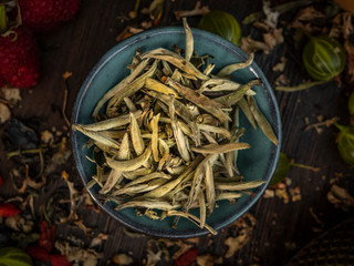 Preparation of the tea ceremony, tea in the bowl. Handmade cups