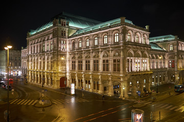 Fototapeta na wymiar Vienna State Opera against sky at night