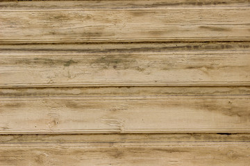 Fototapeta na wymiar Texture of an old wooden panels painted in beige