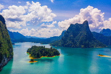 Beautiful mountain and blue sky with cloud in Khao Sok National park locate in Ratchaprapha dam in Surat Thani province, Thailand.