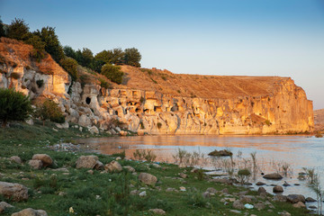 Panoramic view of the Old Tigris Bridge, Castle and minaret in the city of Hasankeyf, Turkey....