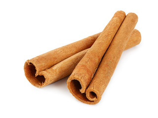 Two cinnamon sticks isolated on white