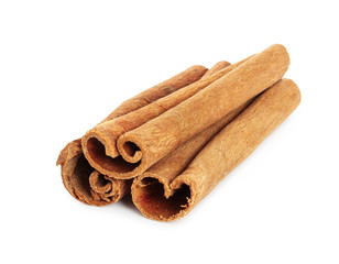 Three cinnamon sticks isolated on white