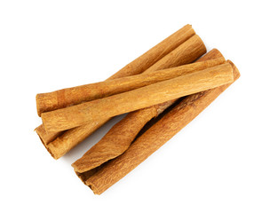 Three cinnamon sticks isolated on white
