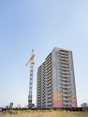 Fototapeta na wymiar multi-storey building under construction against the sky. New homes will await families. Mortgage