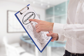 Business, technology, internet and network concept. Young businessman points to the keyword:...