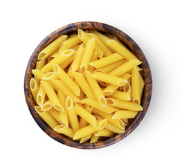 Pile of raw macaroni  in wood bowl Isolated on white background