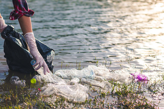 Women volunteer help garbage collection for to recycling and the campaign to stop using plastic to reduce global warming.