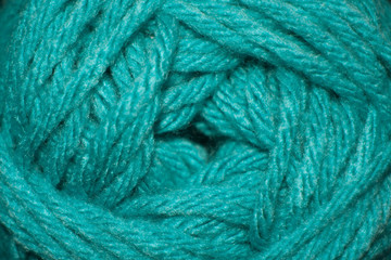 Ovillo de lana verde azulado