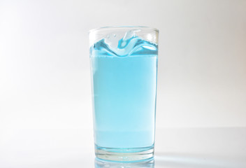 Water blue and air bubbles over white background 