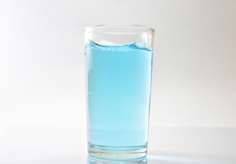 Water blue and air bubbles over white background 