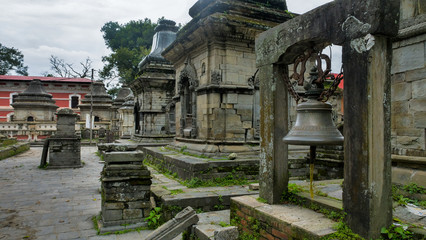 Old architecture and ancient religion buildings in the area of Pashupatinath temple in Kathmandu, Nepal
